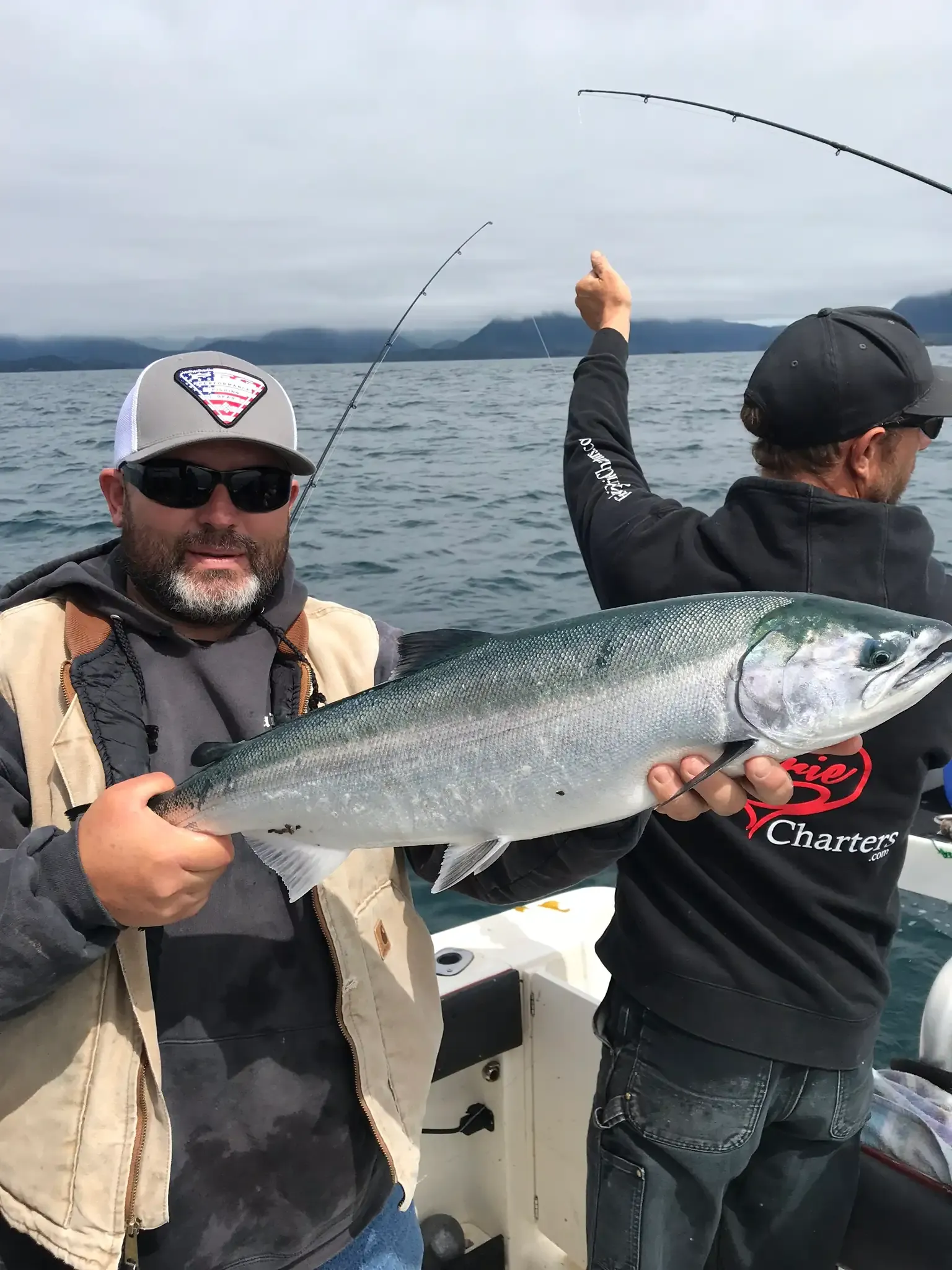 Captain Jason with silver salmon