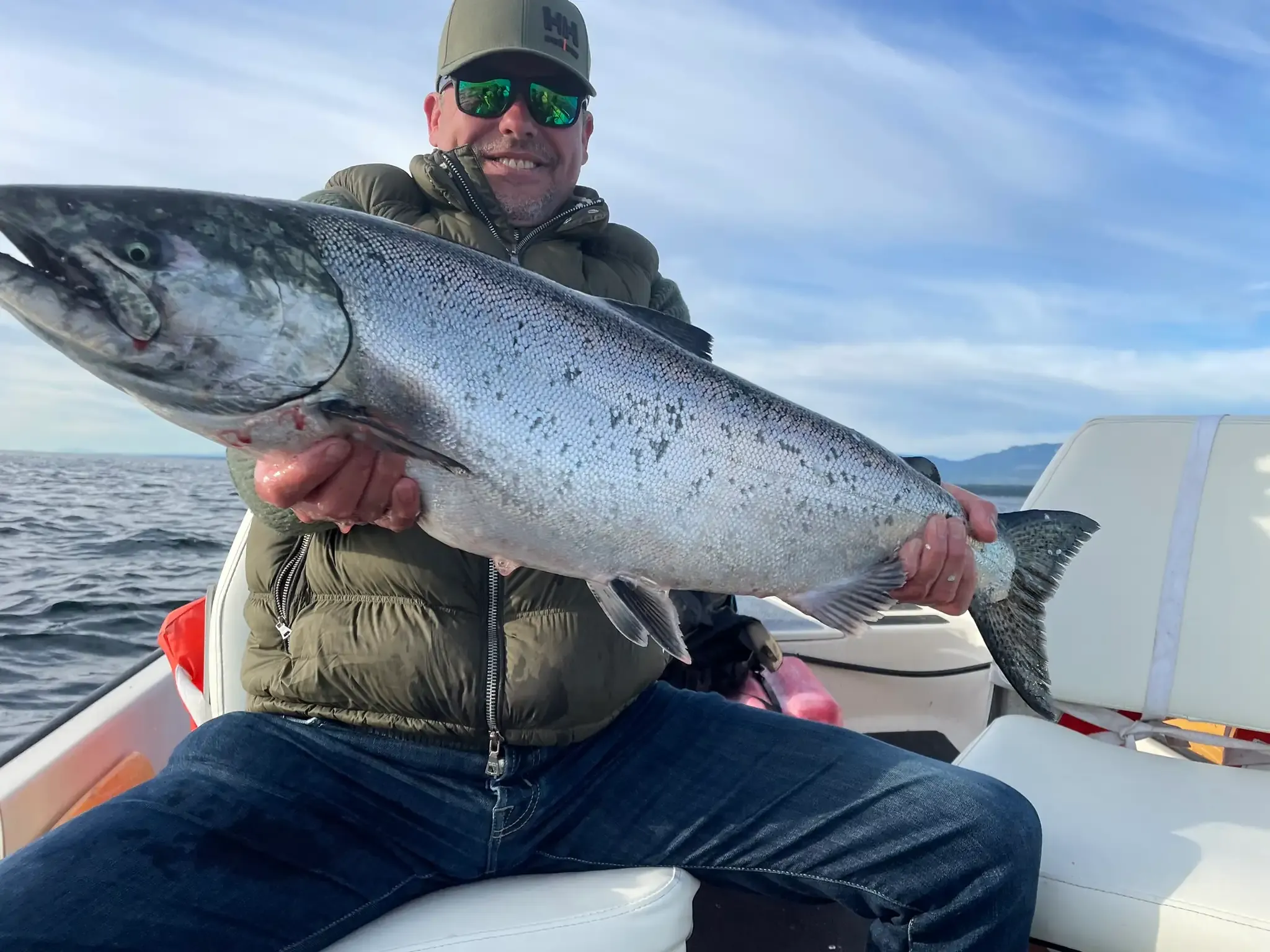 Angler with Massive Trophy Chinook Salmon