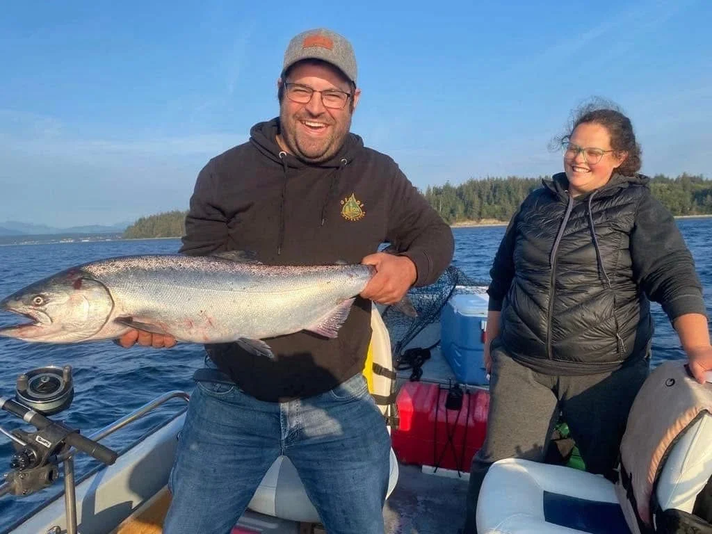 Couple with Chinook at Sunset